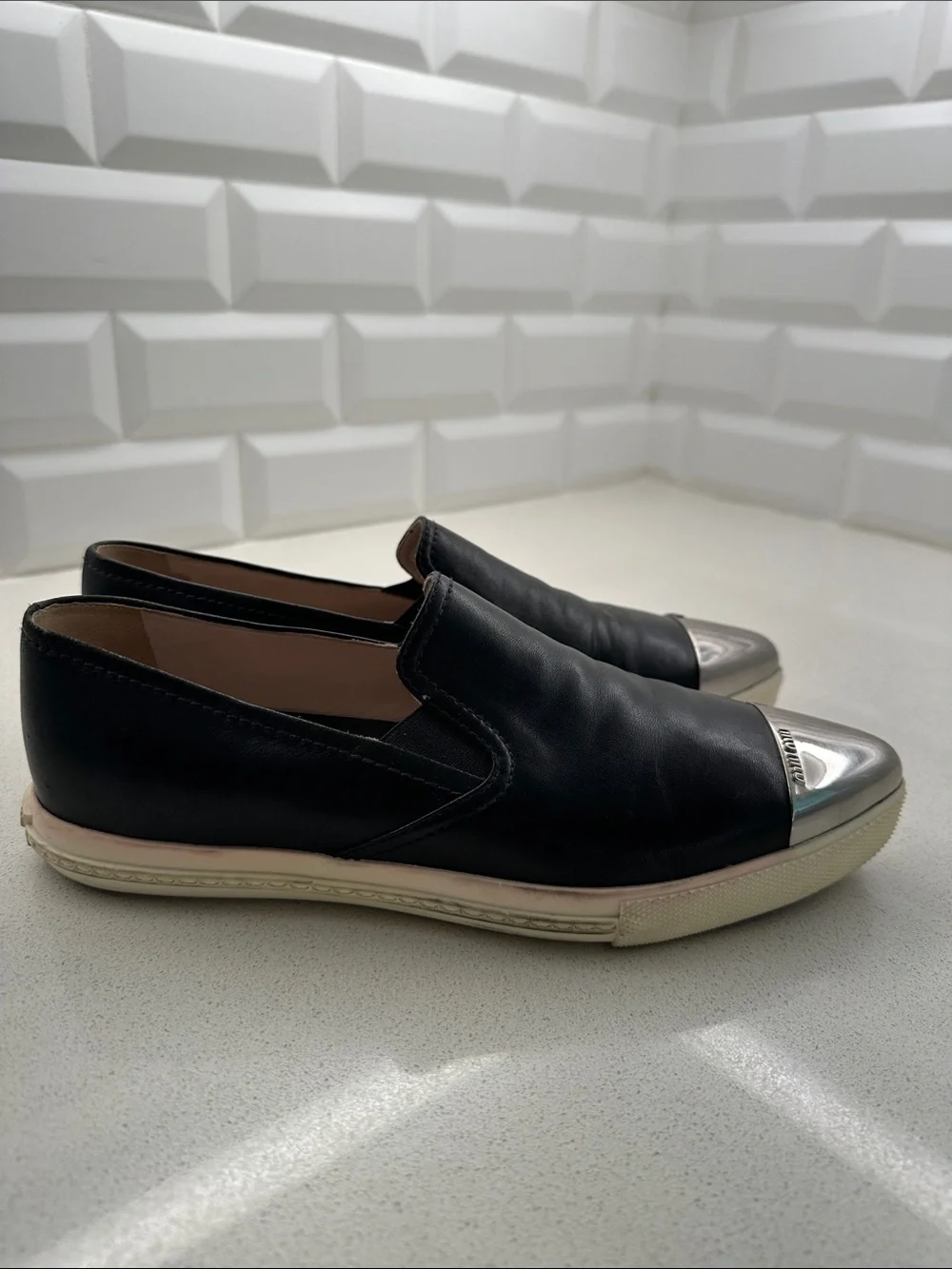 Miu Miu Black Leather Slip-On Flats with Silver Cap Toe